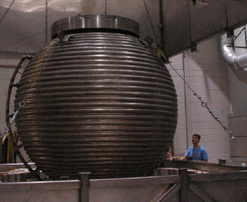 photo of large stainless steel sphere in lab