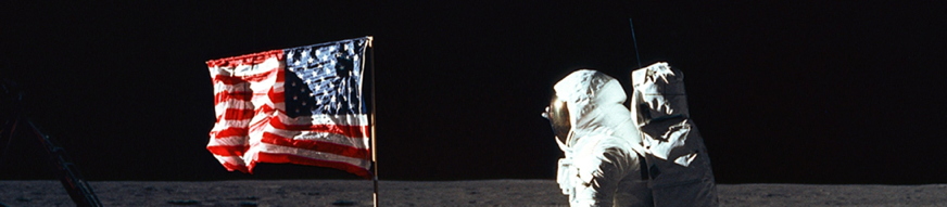 Photo of Buzz Aldrin and US flag
  on the Moon
