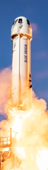 photo of New Shepard rocket lifting off