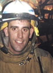 photo of Brian Roberts in 
firefighting gear